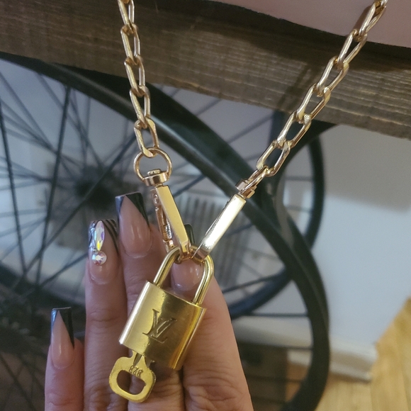 Louis Vuitton Authentic Lock with key. - Picture 3 of 10